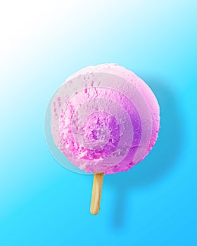 Pink ice cream ball on a stick