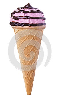 Pink ice cream with chocolate sauce in a waffle cone