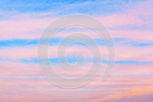 Pink ÃÂirrus clouds blue sky background closeup, red dawn cirrostratus cloud texture, purple evening sunset morning sunrise clouds