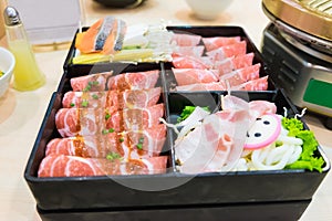 Pink kamaboko sliced, japanese fish cake, pork belly sliced and