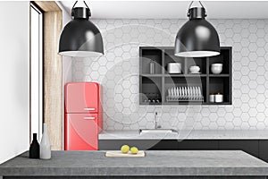 Pink kitchen, black counter, cooker