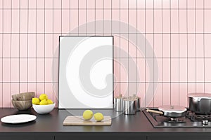 Pink kitchen, black counter, cooker, poster