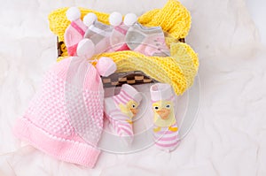 Pink knit hat and socks gift set for a newborn baby girl