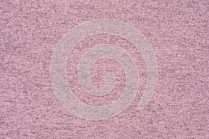 Pink knitted fabric, draped jersey cloth background. Knitted background, knitwear