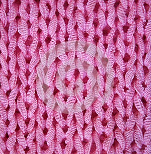 Pink knitted textured background