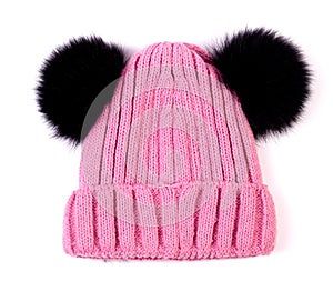 Pink knitted wool children hat isolated