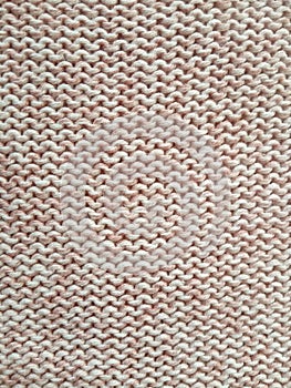 Pink knitting wool pattern background and texture
