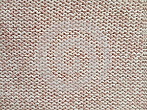 Pink knitting wool pattern background and texture