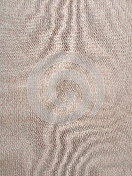 Pink knitting wool pattern background and texture