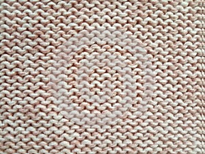 Pink knitting wool pattern background and texture