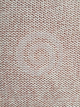 Pink knitting wool pattern background and texture