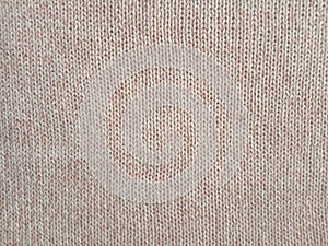 Pink knitting wool pattern background and texture