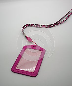 Pink leather card holder with detachable weaving neck strap in d