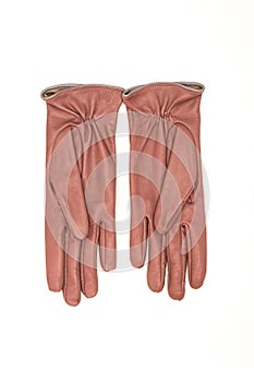 Pink leather women`s gloves on a white background