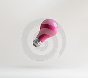 Pink light bulbs floating