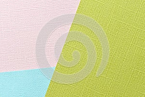 Pink, light green, blue abstract paper background. Paper texture