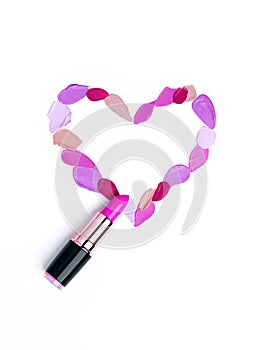 Pink lipstick smeared in the shape of heart