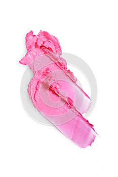 Pink lipstick stroke for makeup as sample of cosmetic product