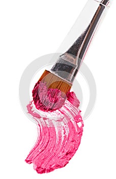 Pink lipstick stroke (sample) with makeup brush