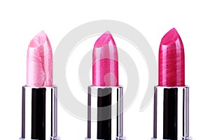 Pink lipsticks on white