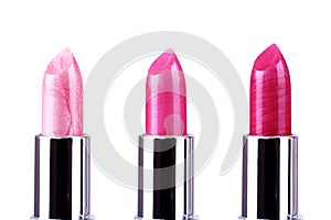 Pink lipsticks on white photo