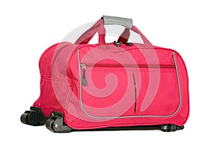 Pink luggage with wheels
