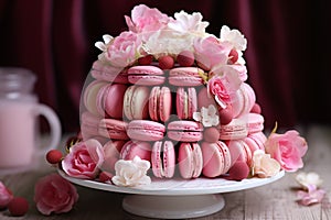 Pink macarons tower with fresh flowers