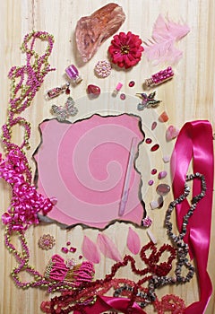 Pink and Magenta Jewelry With Rose and Blank Paper With Burned Edges
