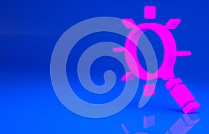 Pink Magnifying glass icon isolated on blue background. Search, focus, zoom, business symbol. Minimalism concept. 3d