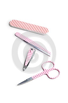 Pink manicure tools. Nail scissors and accessories