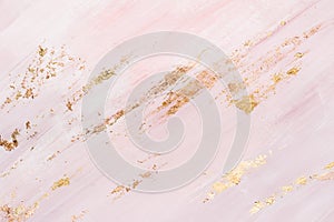 Pink marble pattern background with gold brushstrokes. Place for your design