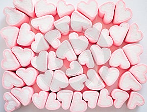 Pink marshmallow background, Many hearts marshmallows, Sweets in the form of hearts of marshmallow. Valentine`s Day Gift