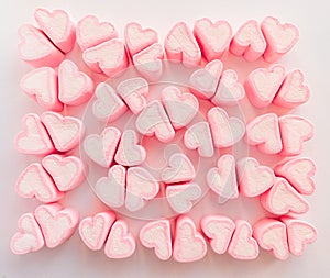 Pink marshmallow background, Many hearts marshmallows, Sweets in the form of hearts of marshmallow. Valentine`s Day Gift