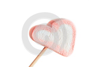 Pink marshmallow on a skewer close up white background, One heart marshmallows on a stick ready to fry, Sweets in the