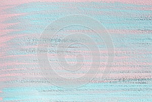 Pink and metallic paint brush strokes on blue background. Hand painted background or texture for your design