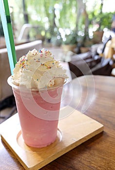 Pink milk cold drink for summer so delicious, sweet cold strawberry fresh milk and bread with fluffy whipped cream