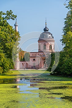 Pink mosque at the Schwetzingen palace in Germany during sunny summer day