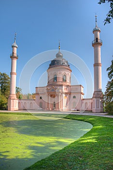 Pink mosque at the Schwetzingen palace in Germany during sunny summer day