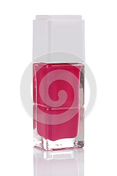 Pink nail polish bottle with reflection