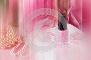 Pink nail varnish abstract background makeup concept photo