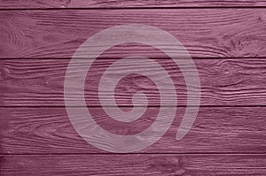 Pink natural wooden background. Wood planks. Violet natural wooden background.