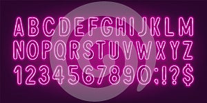 Pink neon light font on a dark background.