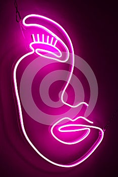Pink neon sign beauty face. Trendy style