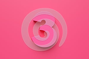 Pink number three on pink background