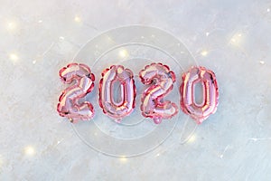 Pink numbers 2020 on a white background.