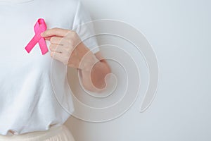 Pink October Breast Cancer Awareness month, woman with pink Ribbon in hospital for support people life and illness. National