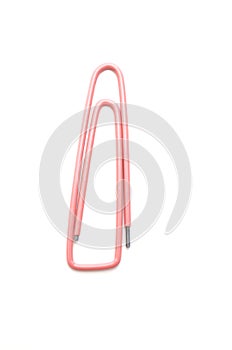 Pink old paper clip isolated