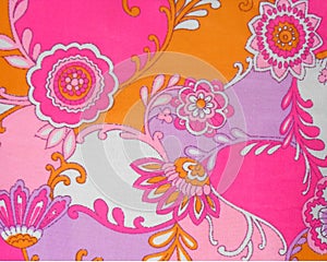 A sample of the fabric: the pink-orange colours with floral motifs