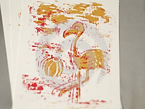 Pink and orange flamingo print on paper