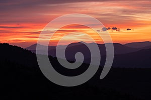 Pink and Orange Layers of Sunrise Over the Blue Ridge Mountains